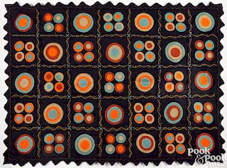Vibrant penny rug