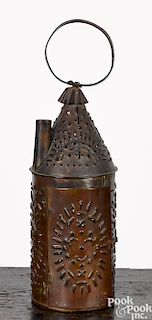Punched tin candle lantern