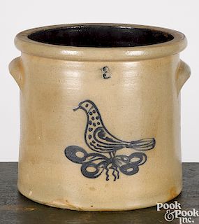 Two stoneware vessels with bird decoration