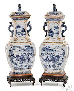 Pair of Chinese export porcelain covered urns