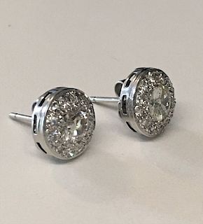 PR OF ROUND DIAMOND EARRINGS SET IN DIAMOND FRAMES