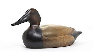 A Carved and Polychrome Decorated Duck Decoy, Width 14 inches.