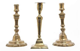 A Pair of English Brass Candlesticks, Height of first 10 inches.