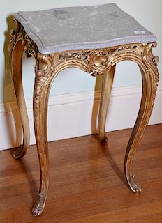 Louis XV style gilt stand with grey marble top. height 27 3/8 inches, top: 14 1/2" x 17" 
***If this lot is not picked up on Sat. 9/...
