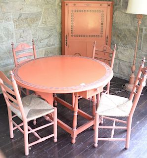 Five piece red painted set including drop leaf table, and four rush seat chairs (1 chair back rail as is). 