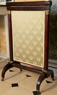 French empire mahogany fire screen with gilt bronze mounts and silk panel. 
height 38 inches, width 24 inches 
***If this lot is not...
