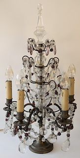Victorian brass and crystal five light candelabra having turned base with five arms and crystal clear and amethyst prisms. 
height 2...