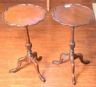 Pair of mahogany piecrust tea kettle stands. 
height 21 inches, diameter 12 inches 
***If this lot is not picked up on Sat. 9/22, Su...