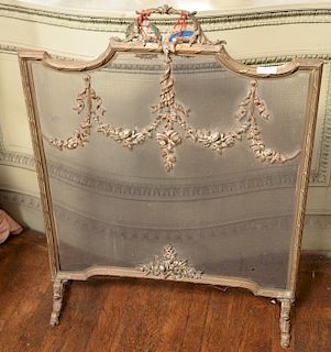 Brass trimmed fire screen on scrolled feet. 
height 31 1/2 inches, width 25 inches 
***If this lot is not picked up on Sat. 9/22, Su...