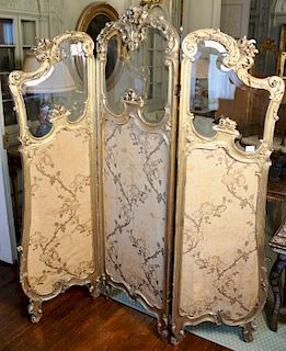 Louis XV style gilt dressing screen with shaped bevel glass top above silk panels (some silk as is). 
height 68 inches, width 61 1/4...