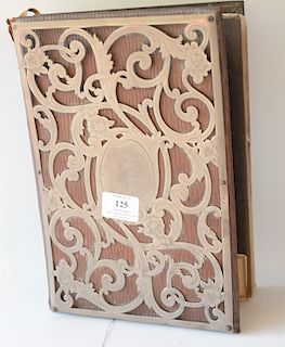 Leather book mounted with sterling silver. 
12" x 8 1/4" 
***If this lot is not picked up on Sat. 9/22, Sun. 9/23, or Tues 9/25 at B...