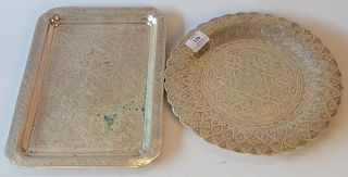 Two Middle Eastern silver platters. 
lengths 11 inches and 12 1/2 inches, 31.3 total troy ounces 
***If this lot is not picked up on...