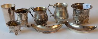 Sterling silver lot to include pair of Howard crescent dishes, two cups, three footed pieces, and a jigger. 
24.9 troy ounces. 
***I...