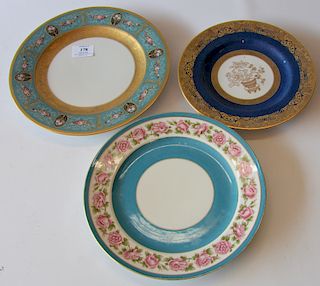 Set of three porcelain plates, set of eleven Black Knight porcelain dinner plates having heavy gilt border sold by Ovington's, Copel...