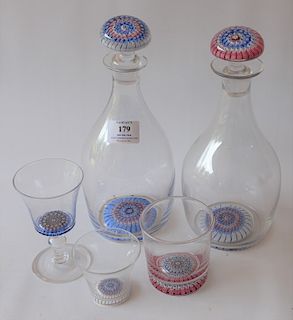 Forty-one piece millefiori cocktail crystal set having millefiori paperweight design in bottom including a pair of decanters with mi...