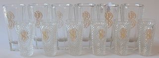 Set of six plus six crystal glasses with gold B (minor chips). 
heights 4 inches and 5 1/4 inches 
***If this lot is not picked up o...