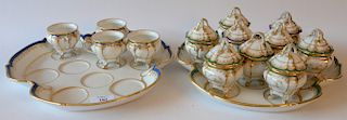 French porcelain pots-de-crème set on tray with addition tray and four cups. 
tray: 12" x 12" 
***If this lot is not picked up on Sa...