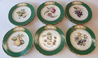 Set of twelve dinner plates with various fruit, marked with coat of arm. 
diameter 9 3/4 inches 
***If this lot is not picked up on ...