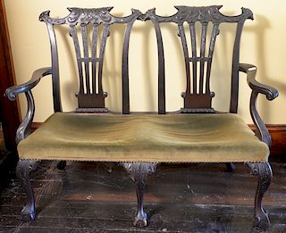 Mahogany Chippendale style double chair back settee with ball and claw feet. 
height 40 inches, width 53 inches 
***If this lot is n...