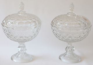 Pair of pressed glass covered dishes. 
height 12 inches, diameter 8 inches 
***If this lot is not picked up on Sat. 9/22, Sun. 9/23,...