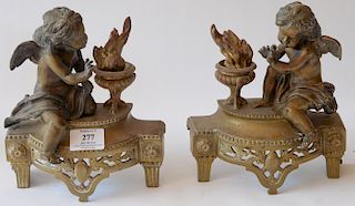 Pair of bronze figural chenets having putti. 
height 8 1/2 inches 
***If this lot is not picked up on Sat. 9/22, Sun. 9/23, or Tues ...