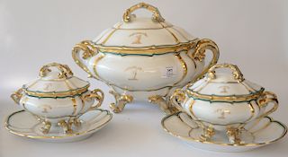 Three piece Paris porcelain lot with large covered tureen, two covered sauce dishes and under plates, griffin head coat of arms: "Gau...