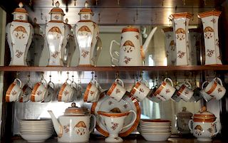 Reproduction export china lot to include a pair of vases, three covered urns, teapot, dishes, cups, saucers, etc., forty-two total p...