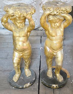 Pair of carved gilt putti figures. 
height 36 1/2 inches 
***If this lot is not picked up on Sat. 9/22, Sun. 9/23, or Tues 9/25 at B...