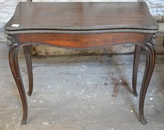 Louis XV rosewood game table with felt interior and bronze mounts, on cabriole legs. 
height 28 inches, width 33 1/2 inches 
***If t...