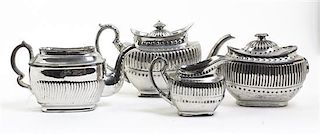 An English Lusterware Tea and Coffee Service, Width of first 11 3/8 inches.
