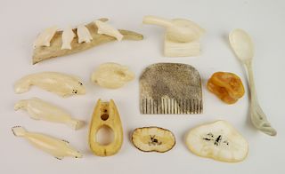 12 Eskimo carved ivory items