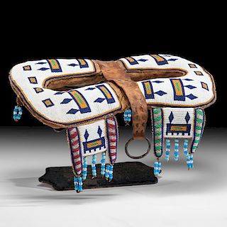 Plains Cree Beaded Hide Pad Saddle, From the Collection of Charles and Valerie Diker