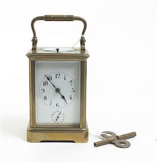 A French Brass Carriage Clock, Height over handle 6 inches.