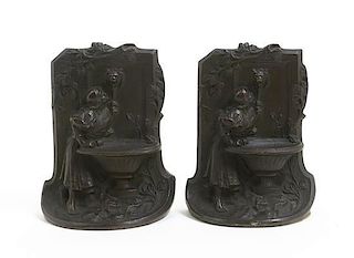 A Pair of Bronze Book Ends, Height 5 1/4 inches.