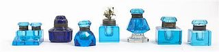 A Collection of Blue Glass Inkwells, Width of widest 3 inches.