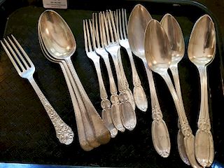 Tray lot of silver flatware to include five matching spoons, five forks, three large spoons, and a sterling fork