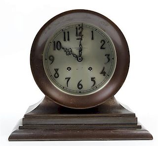 A Bronze Chelsea Ships Clock, retailed by Abercrombie and Fitch, Height 9 1/2 inches.