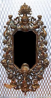A Rococo Style Gilt Metal Mirror, Height 28 1/2 x width 15 inches.