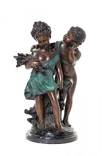 A Continental Bronze Figural Group, after Auguste Moreau, Height 16 1/2 inches.