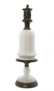 An Opaline Glass Oil Lamp, Height overall 34 1/2 inches.