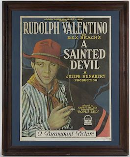 A Framed Reproduction Movie Poster, Height 34 1/2 x width 28 1/4 (framed).