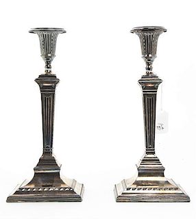 A Pair of English Silver-Plate Candlesticks, Height 11 inches.