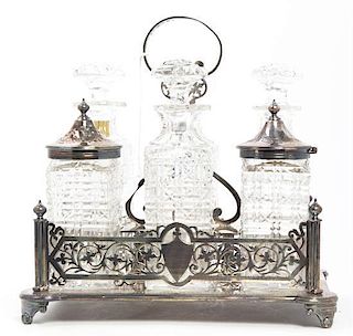 An English Silver-Plate and Cut Glass Cruet Set, Height overall 8 inches.