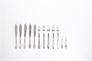 A German Silver Ten-Piece Fish Service, Length of knife 8 inches.