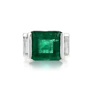 An Emerald and Diamond Platinum Ring