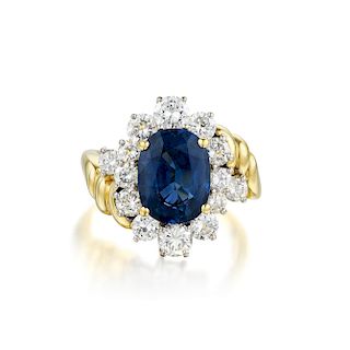 A Sapphire and Diamond Ring, English
