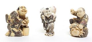 A Group of Three Carved Ivory Netsuke, Height of tallest 2 1/4 inches.