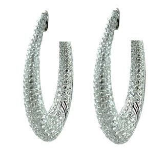 14K Ladies Diamond hoop Earrings.