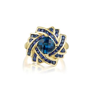 A 10K Gold Blue Topaz and Sapphire Ring