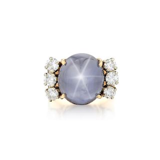 A 14K Gold Star Sapphire and Diamond Ring